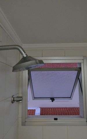 Casa de condomínio à venda com 141m², 3 quartos e 2 vagasBanheiro Social