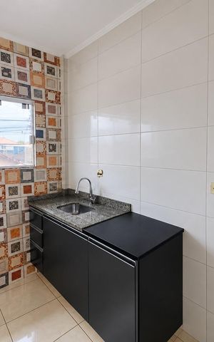 Casa de condomínio para alugar com 55m², 2 quartos e 1 vagaCozinha