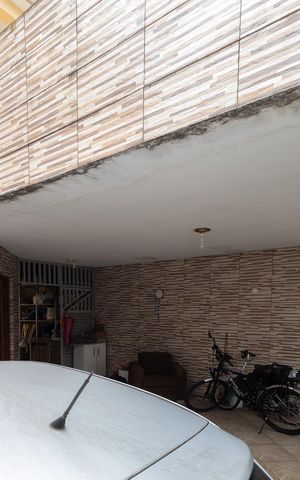 Casa à venda com 165m², 4 quartos e 2 vagas Casa à venda com 165m², 4 quartos e 2 vagasGaragem