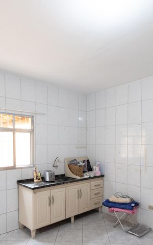 Casa à venda com 165m², 4 quartos e 2 vagas Casa à venda com 165m², 4 quartos e 2 vagasCozinha