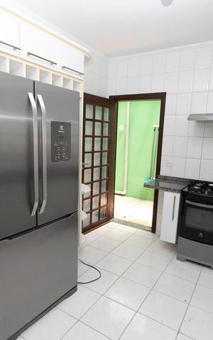 Casa de condomínio para alugar com 140m², 3 quartos e 4 vagasCOZINHA