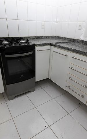 Casa de condomínio para alugar com 140m², 3 quartos e 4 vagasCOZINHA