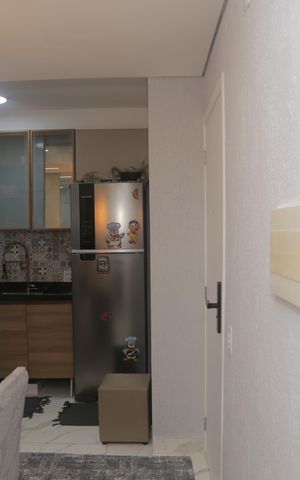 Apartamento para alugar com 48m², 2 quartos e sem vaga Apartamento para alugar com 48m², 2 quartos e sem vagaVista do corredor para a cozinha