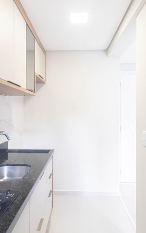 Apartamento para alugar com 50m², 2 quartos e 1 vaga Apartamento para alugar com 50m², 2 quartos e 1 vagaCozinha e Área de Serviço
