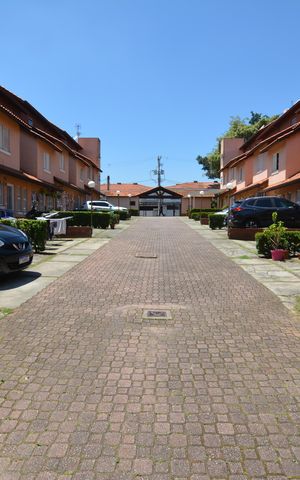Casa de condomínio à venda com 120m², 3 quartos e 2 vagasAREA EXTERNA
