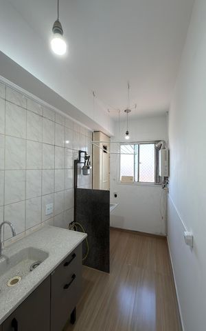 Apartamento para alugar com 45m², 2 quartos e 1 vaga Apartamento para alugar com 45m², 2 quartos e 1 vagaCozinha e Área de Serviço