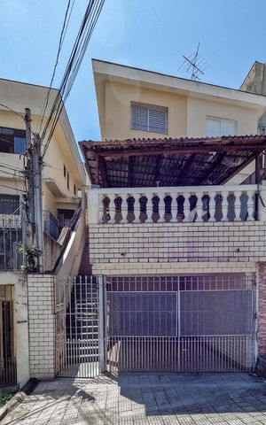 Casa à venda com 100m², 3 quartos e 2 vagas Casa à venda com 100m², 3 quartos e 2 vagasFachada