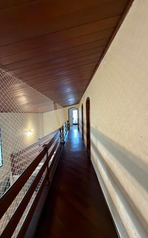 Casa de condomínio para alugar com 380m², 4 quartos e 3 vagasCorredor