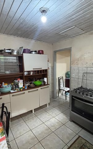 Casa à venda com 98m², 5 quartos e 3 vagas Casa à venda com 98m², 5 quartos e 3 vagasCozinha 2