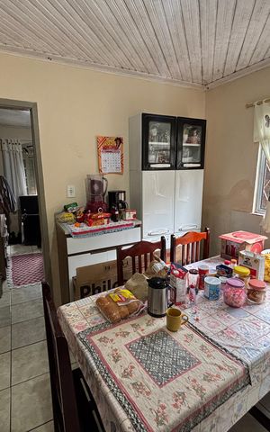 Casa à venda com 98m², 5 quartos e 3 vagas Casa à venda com 98m², 5 quartos e 3 vagasCozinha