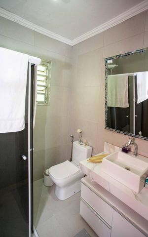 Casa à venda com 210m², 4 quartos e 2 vagasBanheiro