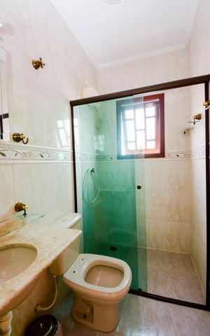 Casa à venda com 138m², 3 quartos e 2 vagasBanheiro da Suíte 1