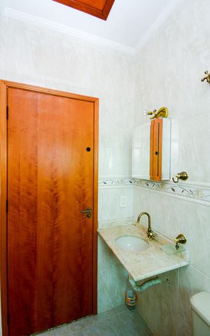 Casa à venda com 138m², 3 quartos e 2 vagasBanheiro da Suíte 1