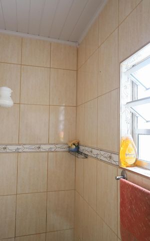 Casa à venda com 175m², 4 quartos e 2 vagasBanheiro 3