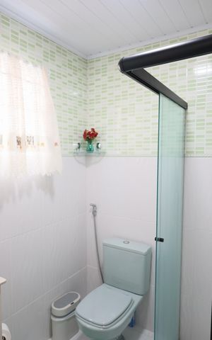 Casa à venda com 175m², 4 quartos e 2 vagasBanheiro da Suíte 1