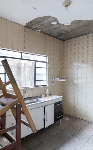 Casa à venda com 260m², 2 quartos e 2 vagas Casa à venda com 260m², 2 quartos e 2 vagasCasa 1 Cozinha