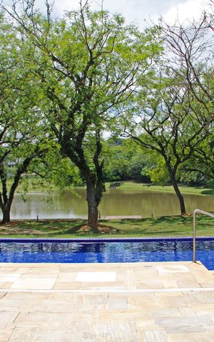 Casa de condomínio à venda com 382m², 5 quartos e 4 vagasÁrea comum - Piscina