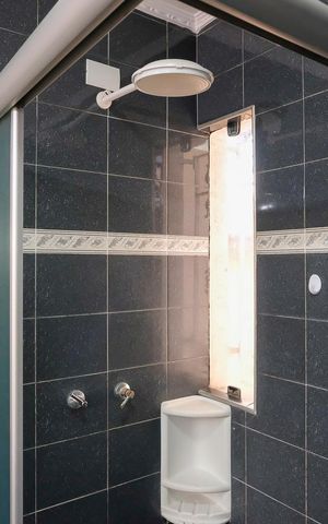 Casa à venda com 346m², 4 quartos e 10 vagasBanheiro da suíte 1