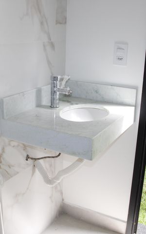 Casa de condomínio à venda com 137m², 3 quartos e 2 vagasBanheiro Churrasqueira