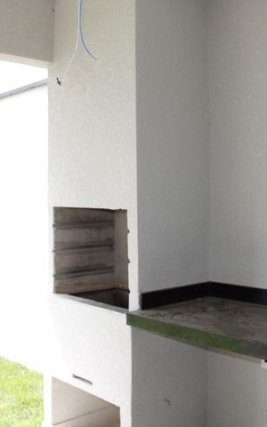 Casa de condomínio à venda com 137m², 3 quartos e 2 vagasChurrasqueira