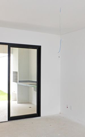 Casa de condomínio à venda com 137m², 3 quartos e 2 vagasSala