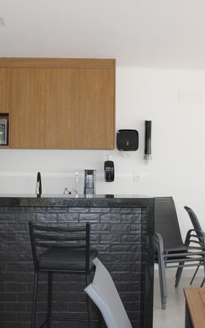 Casa de condomínio à venda com 137m², 3 quartos e 2 vagasÁrea comum - Salão de festas