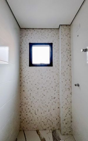 Casa de condomínio à venda com 86m², 2 quartos e 1 vagaBanheiro