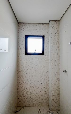 Casa de condomínio à venda com 86m², 2 quartos e 1 vagaBanheiro