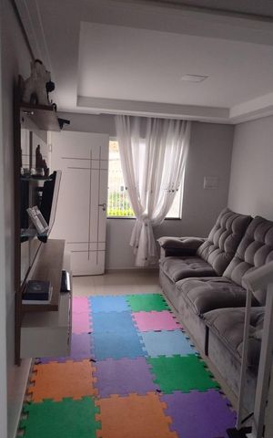 Casa à venda com 100m², 3 quartos e 2 vagas Casa à venda com 100m², 3 quartos e 2 vagasSala