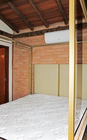 Casa de condomínio para alugar com 300m², 3 quartos e 2 vagasSuíte 1