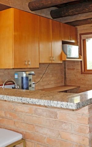 Casa de condomínio para alugar com 300m², 3 quartos e 2 vagasCozinha