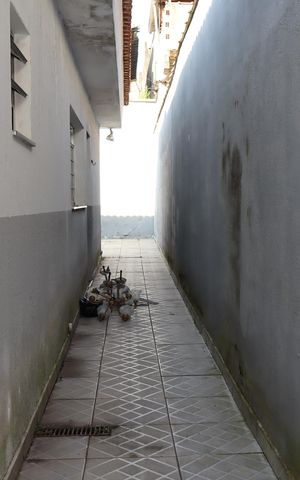 Casa para alugar com 250m², 2 quartos e 2 vagasCorredor externo