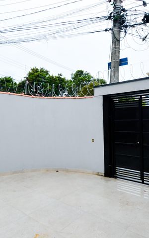 Casa à venda com 64m², 2 quartos e 2 vagasGaragem