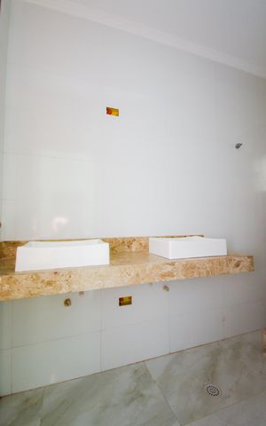 Casa à venda com 64m², 2 quartos e 2 vagasBanheiro da Suíte