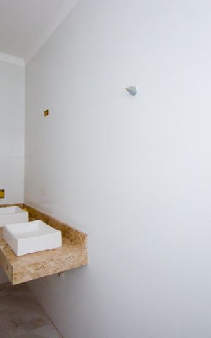 Casa à venda com 64m², 2 quartos e 2 vagasBanheiro da Suíte