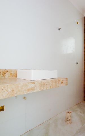 Casa à venda com 64m², 2 quartos e 2 vagasBanheiro da Suíte