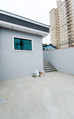Casa à venda com 64m², 2 quartos e 2 vagasGaragem