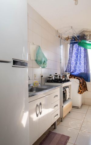 Apartamento à venda com 47m², 2 quartos e 1 vaga Apartamento à venda com 47m², 2 quartos e 1 vagaCozinha e Área de Serviço