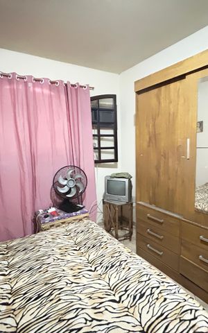 Casa à venda com 50m², 3 quartos e 2 vagasQuarto 3 - Suíte