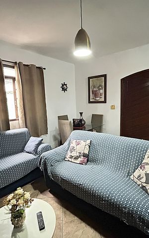 Casa à venda com 50m², 3 quartos e 2 vagasSala