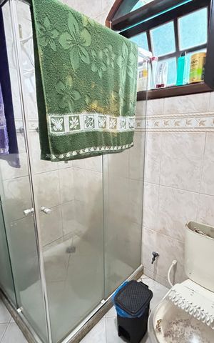 Casa à venda com 50m², 3 quartos e 2 vagasBanheiro da Suíte