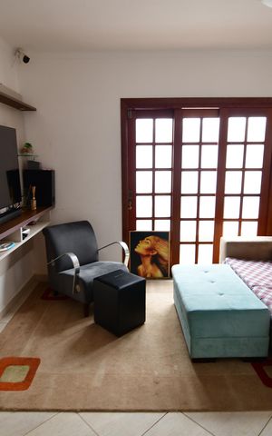 Casa à venda com 190m², 3 quartos e 2 vagasSala de TV