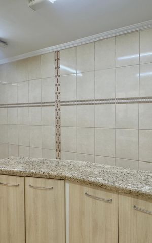 Casa à venda com 147m², 3 quartos e 3 vagas Casa à venda com 147m², 3 quartos e 3 vagasCozinha