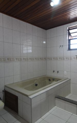 Casa de condomínio para alugar com 265m², 4 quartos e 2 vagasQuarto 4 - Suíte