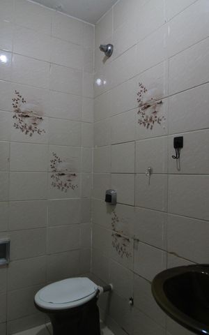Casa de condomínio para alugar com 265m², 4 quartos e 2 vagasBanheiro Social 2