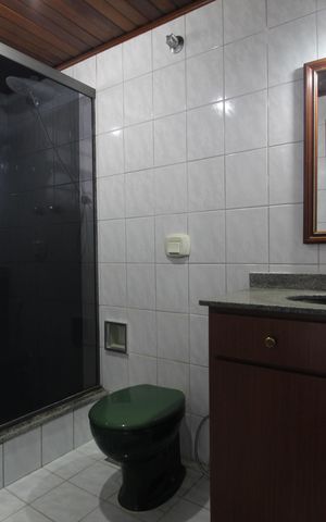 Casa de condomínio para alugar com 265m², 4 quartos e 2 vagasBanheiro Social 1
