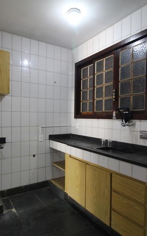 Casa de condomínio para alugar com 265m², 4 quartos e 2 vagasCozinha