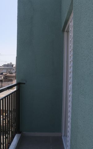Casa para alugar com 80m², 2 quartos e 1 vaga Casa para alugar com 80m², 2 quartos e 1 vagaSacada do quarto 2