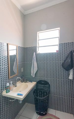 Casa à venda com 180m², 3 quartos e 2 vagas Casa à venda com 180m², 3 quartos e 2 vagasBanheiro da Suíte 1