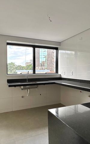 Apartamento à venda com 58m², 2 quartos e 1 vaga Apartamento à venda com 58m², 2 quartos e 1 vagaCozinha e Área de Serviço